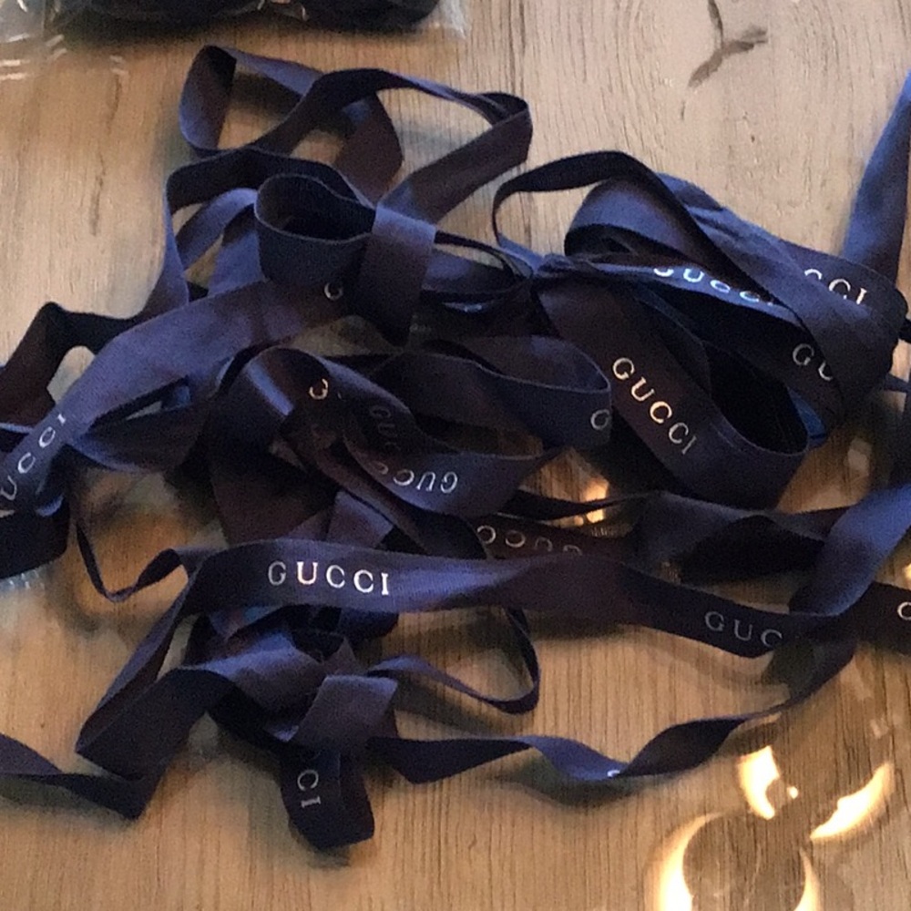 Gucci dark blue with writing  over 100 inches